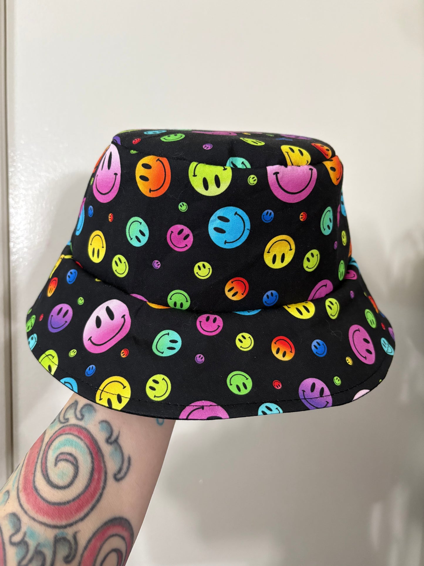 Rainbow smiley face bucket hat