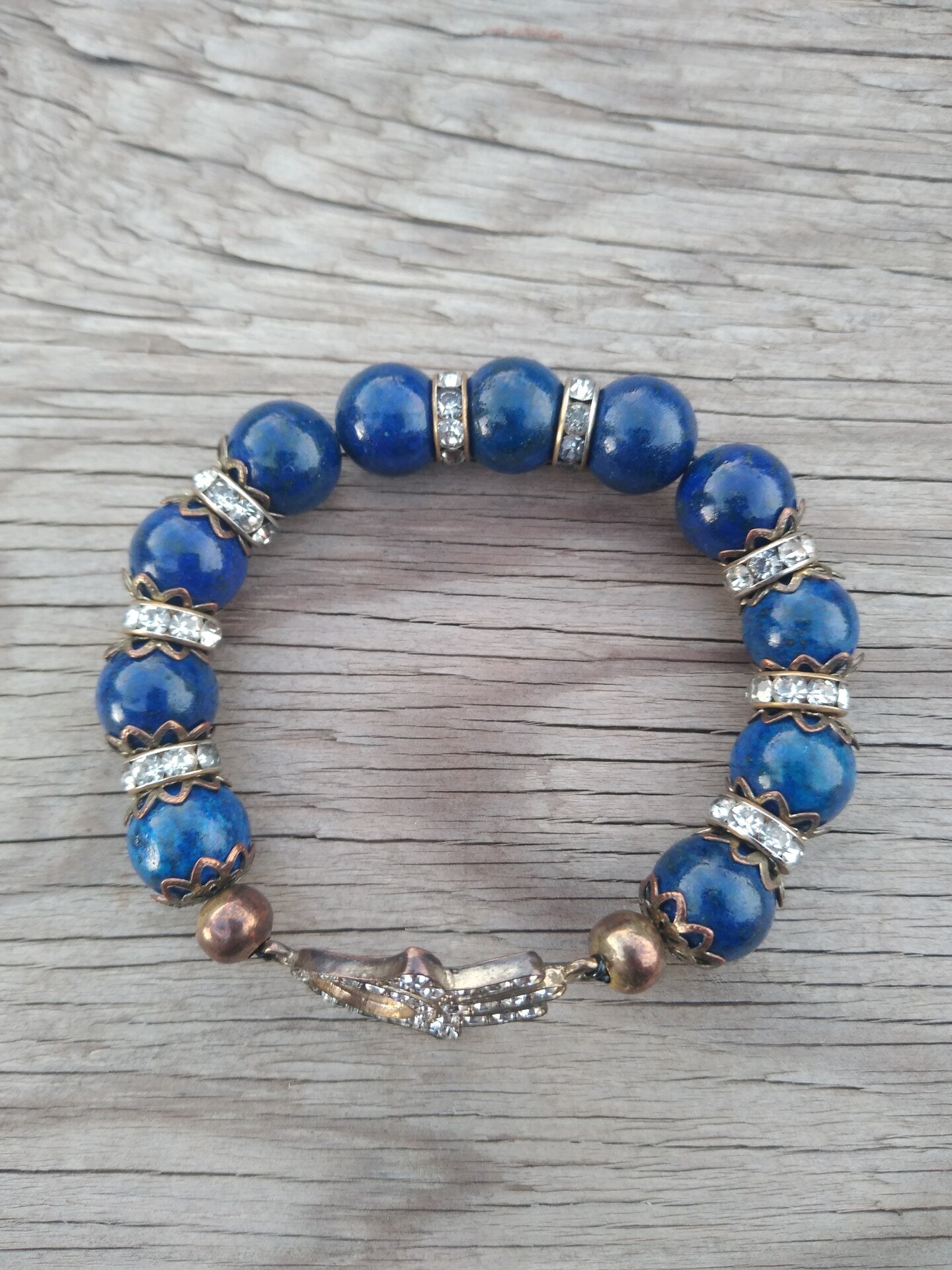 8 Inch 12MM Lapis Lazuli Beads with Bronze Hamsa and Spacers Stretch Bracelet Mens