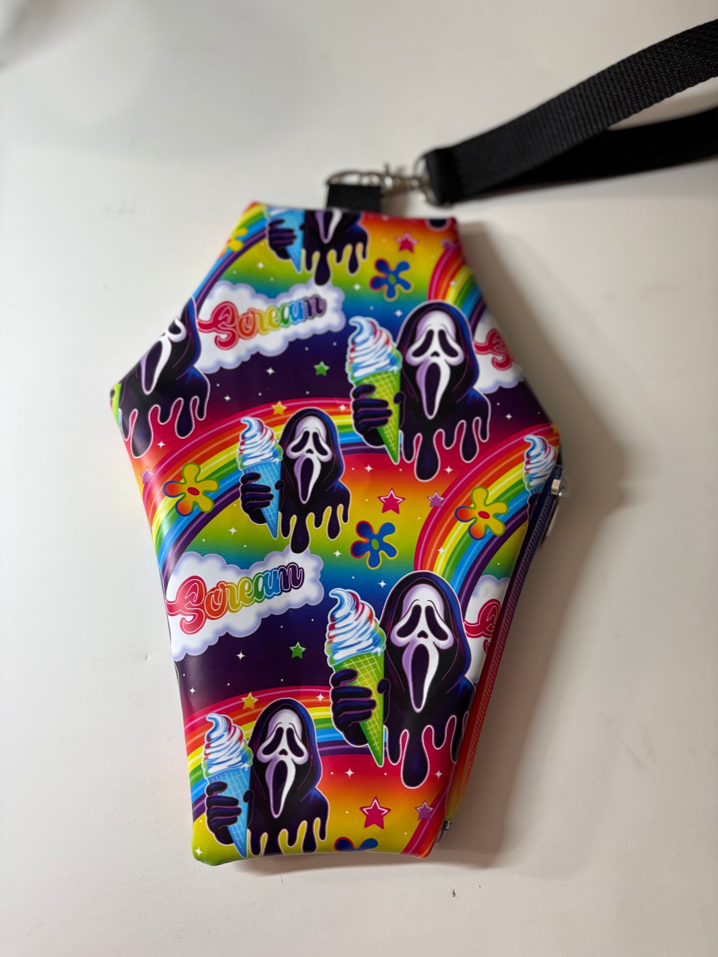 Coffin wristlet pouches