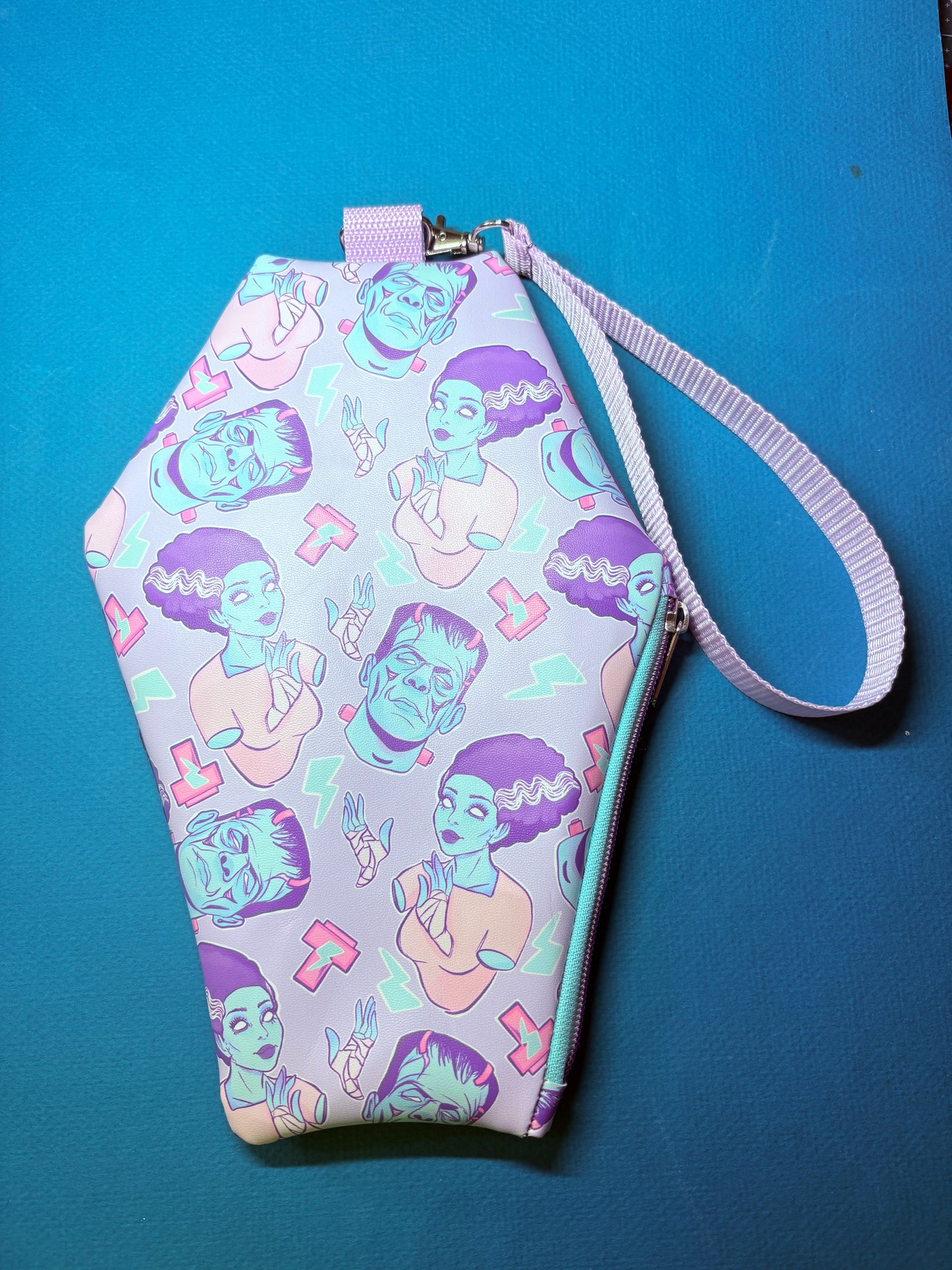 Pastel Frankensteins and bride coffin wristlet