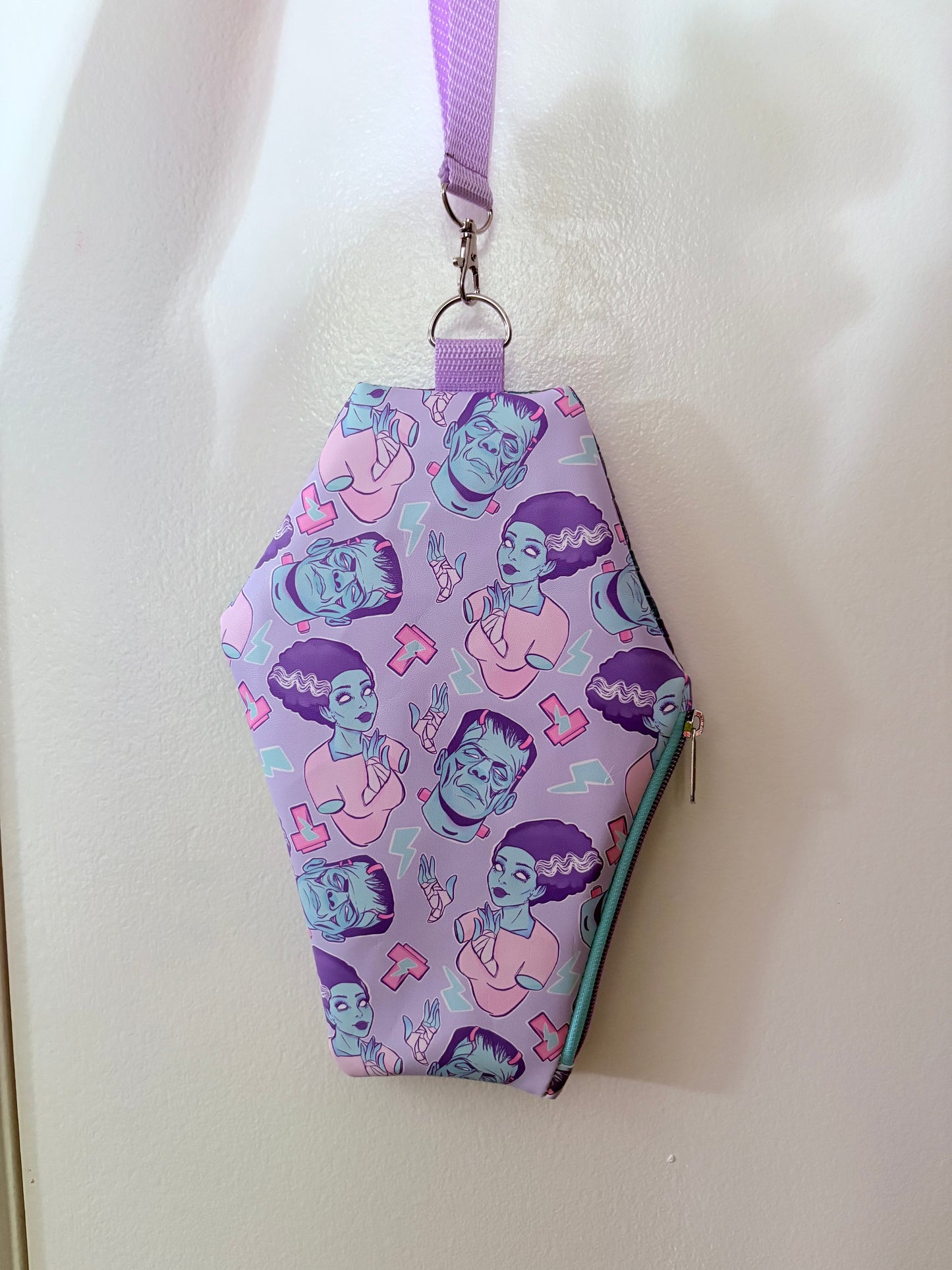 Pastel Frankensteins and bride coffin wristlet