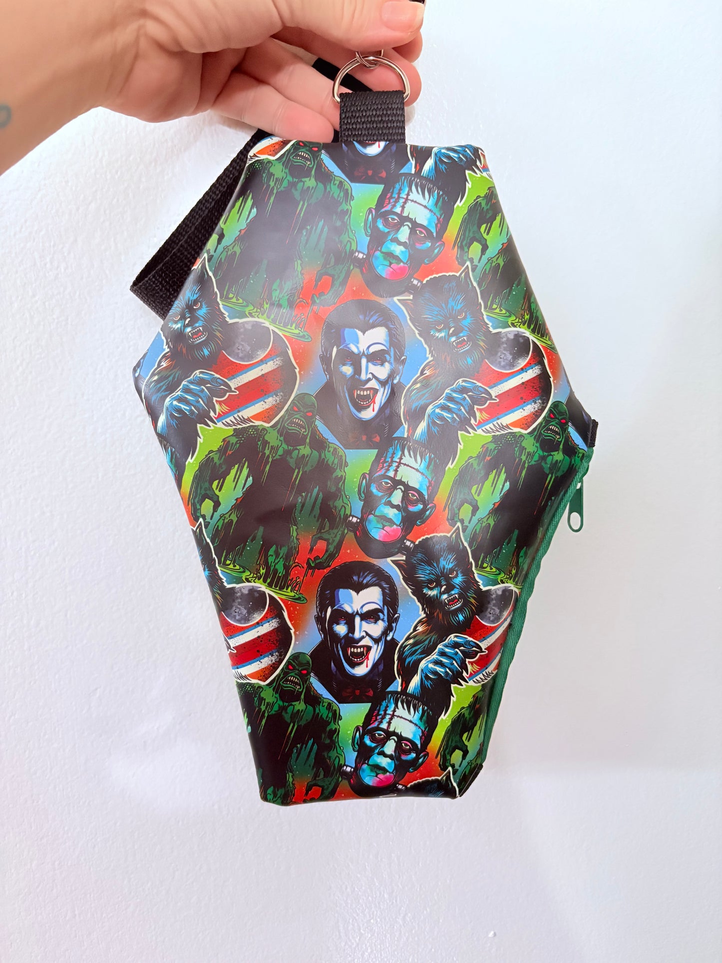 Coffin wristlet pouches