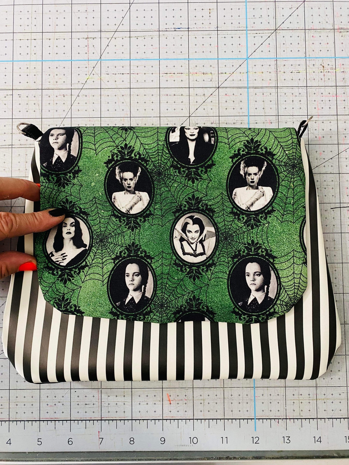 Gotica flap crossbody glow stripes
