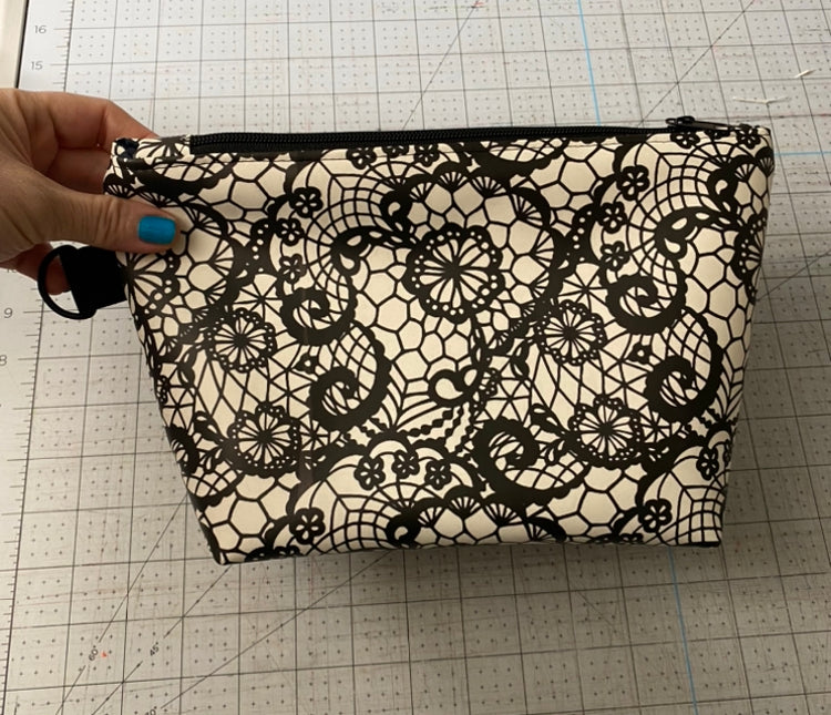 Glow in the dark lace pouch