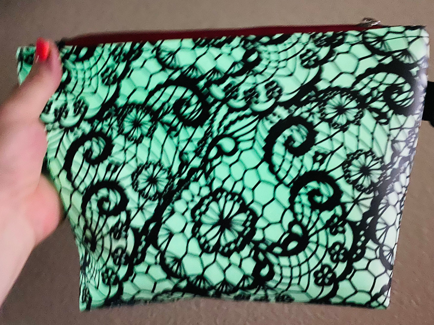 Glow in the dark lace pouch