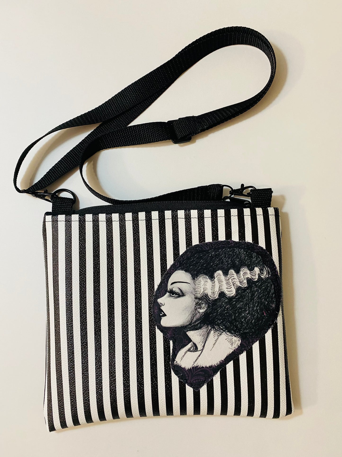 Appliqué striped horror bag