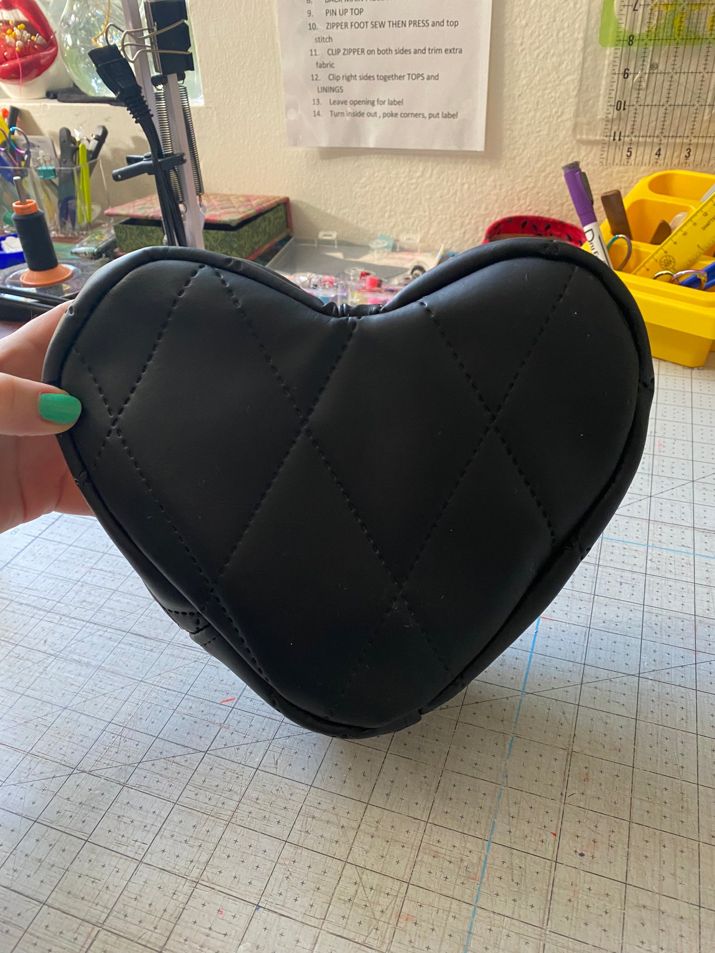 Black quilted heart bag