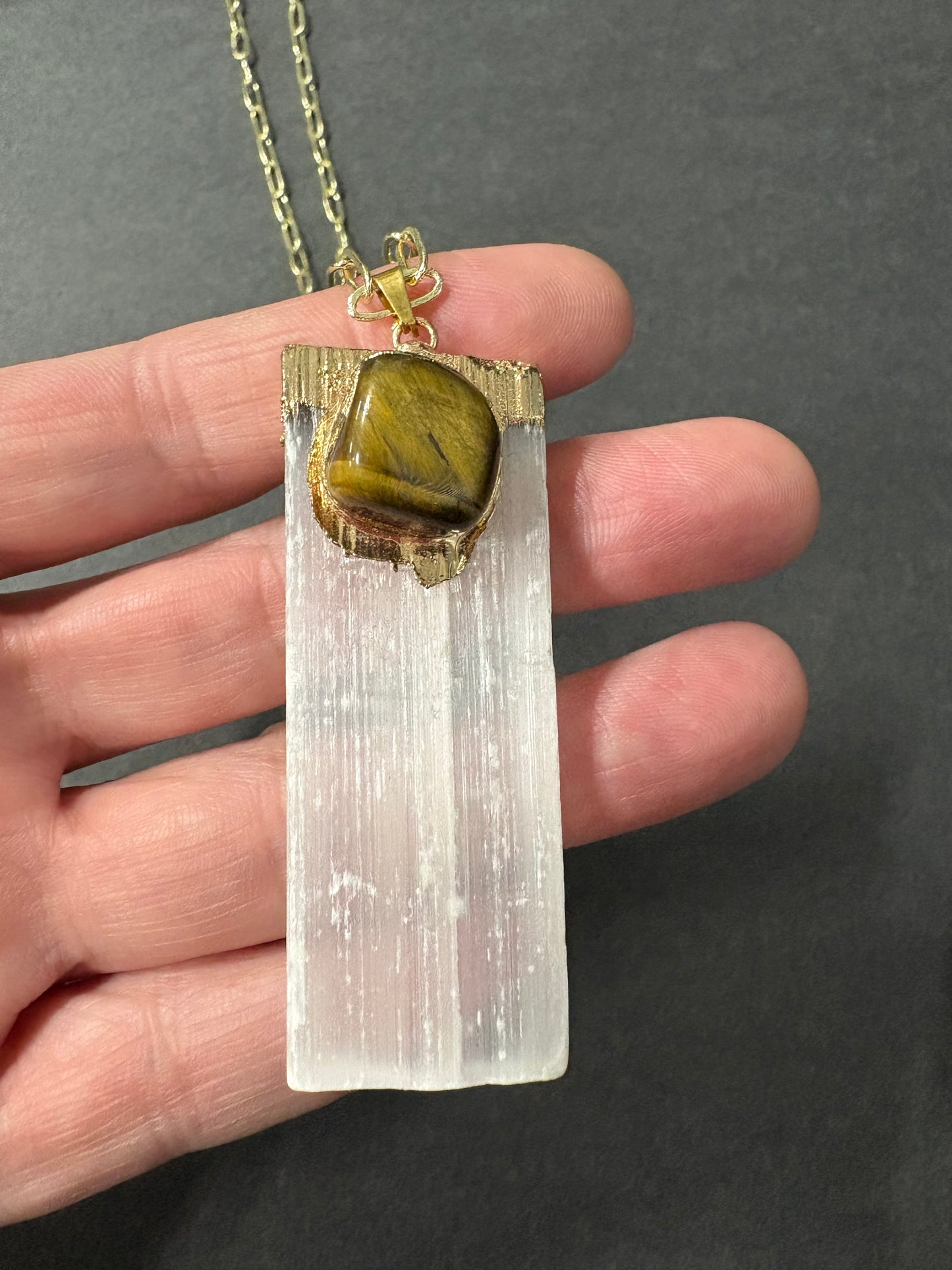 Long 14k gold chain with selenite and togerseye pendant