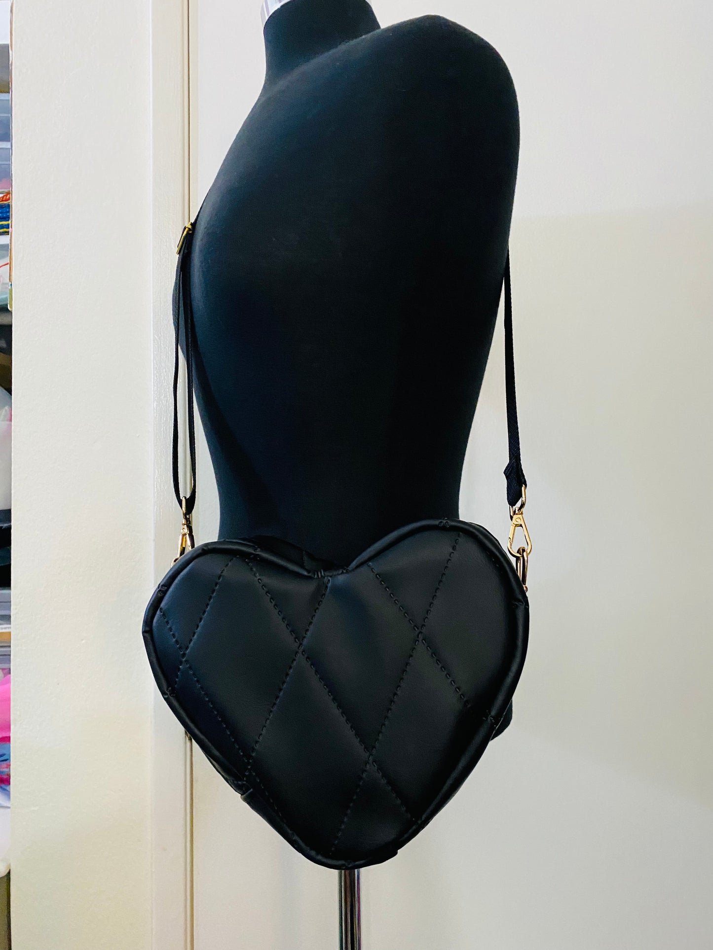 Black quilted heart bag