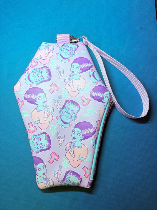 Pastel Frankensteins and bride coffin wristlet