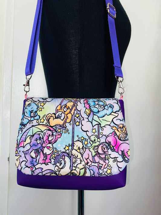 Carousel Pastel bears with purple body and purple strap